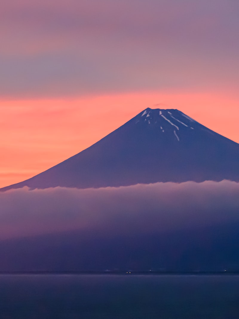 Mount Fuji glowing red at sunset above the lake, a pre-wedding photoshoot location in Japan